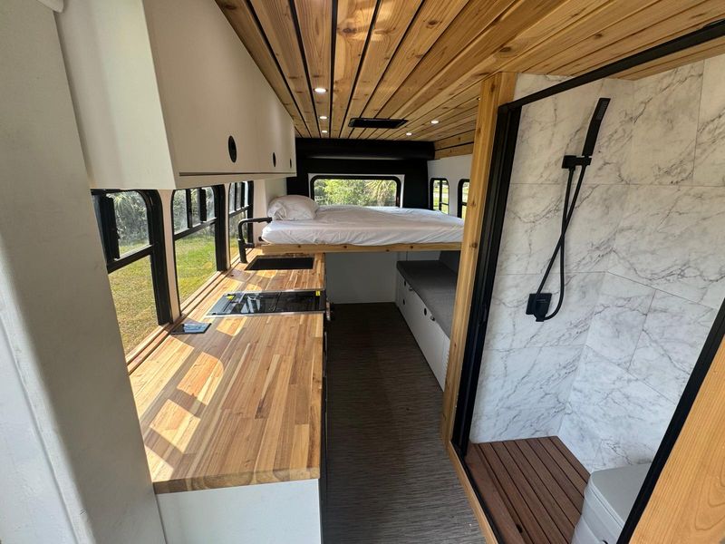 Picture 1/17 of a 2012 Ford Econoline Skoolie Professional Build for sale in Miami, Florida