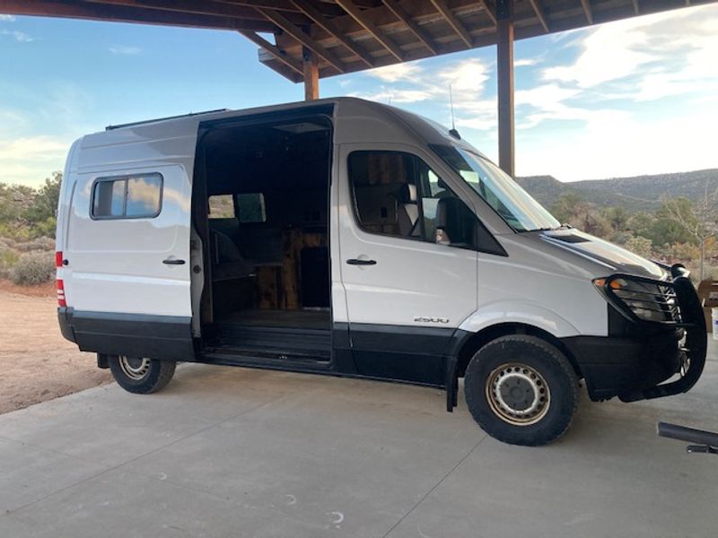 Picture 1/19 of a 2007 dodge sprinter 2500 custom camper van for sale in Moab, Utah
