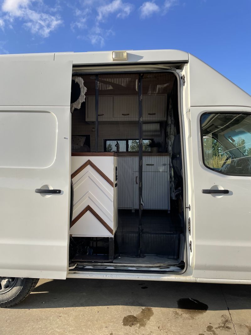 Picture 3/12 of a 2013 Nissan nv2500 campervan for sale in East Glacier Park, Montana