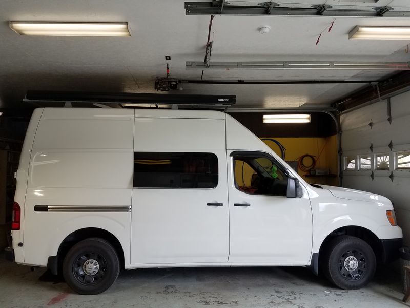 Picture 1/4 of a Nissan NV 2500 HD Quigley 4x4 for sale in Uniontown, Pennsylvania