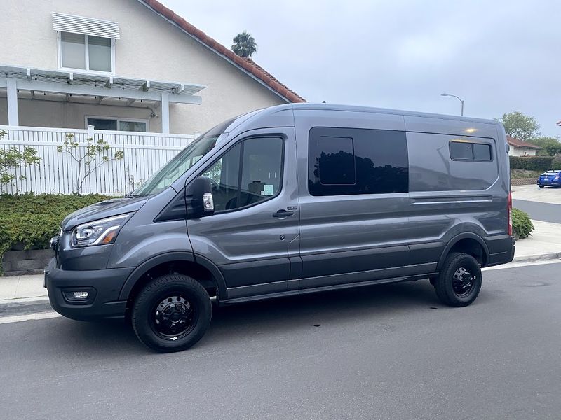 Picture 1/10 of a 2021 AWD Ford Transit  Weekender with Pop Top for sale in Sand Point, Alaska