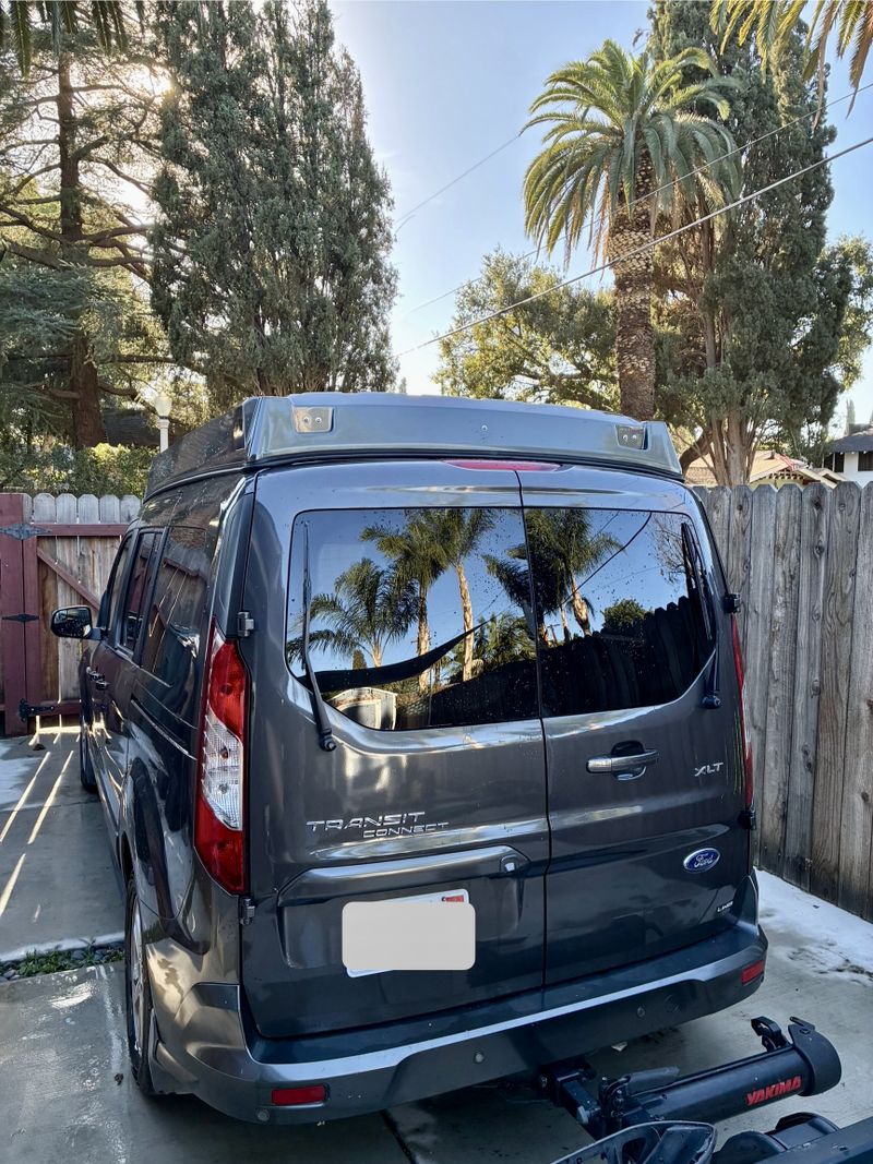 Picture 1/20 of a 2021 Ford Transit Connect XLT with pop top camper for sale in Riverside, California