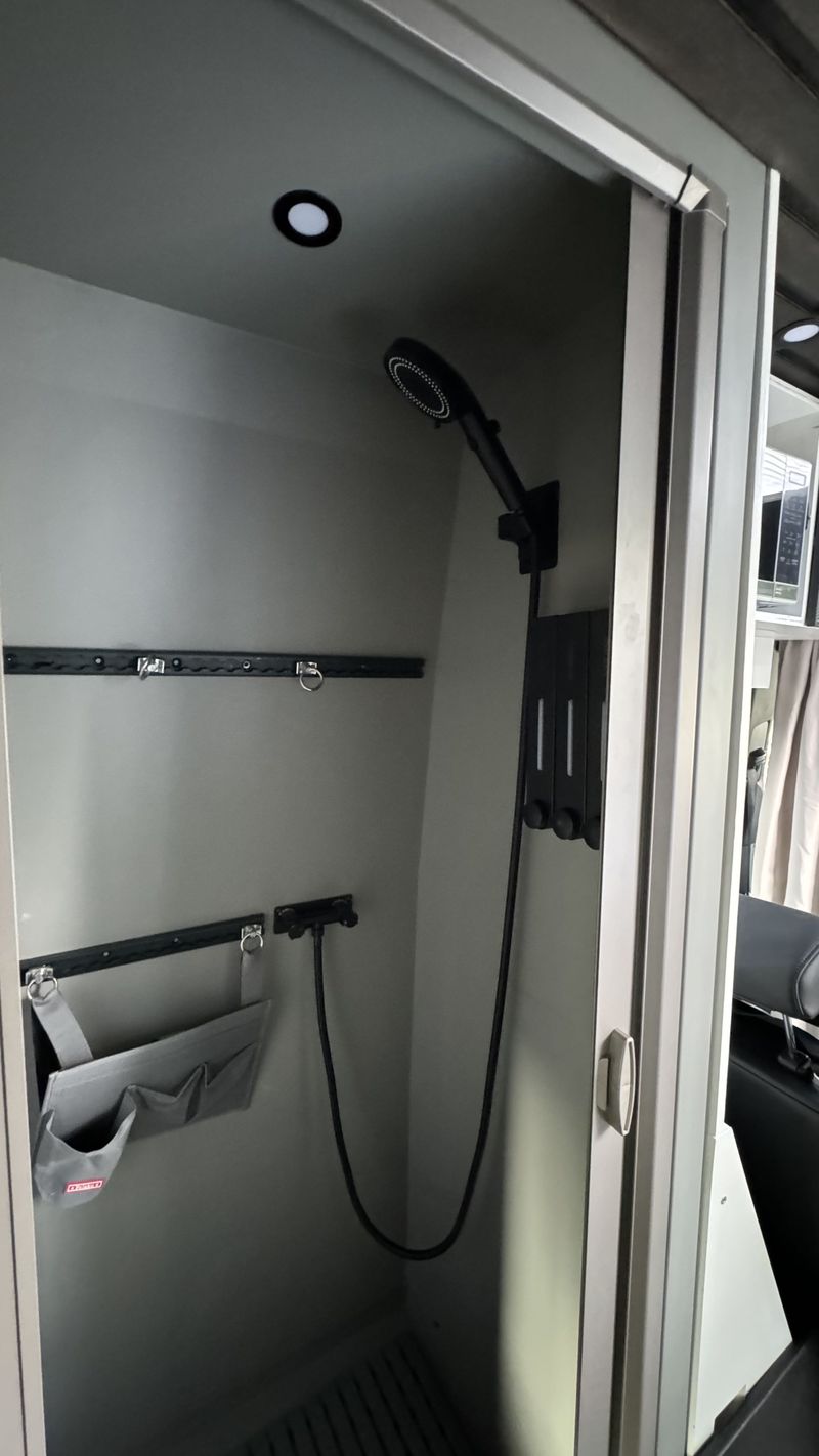 Picture 4/31 of a 144 Sprinter van Sleeps/sits 5 with bathroom & elevator bed  for sale in Big Bear City, California