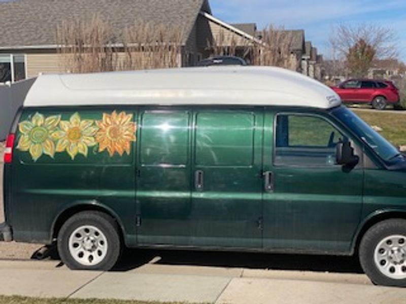 Picture 1/18 of a 2010 Chevy Express with Colorado Camper Van Pop-top for sale in Loveland, Colorado