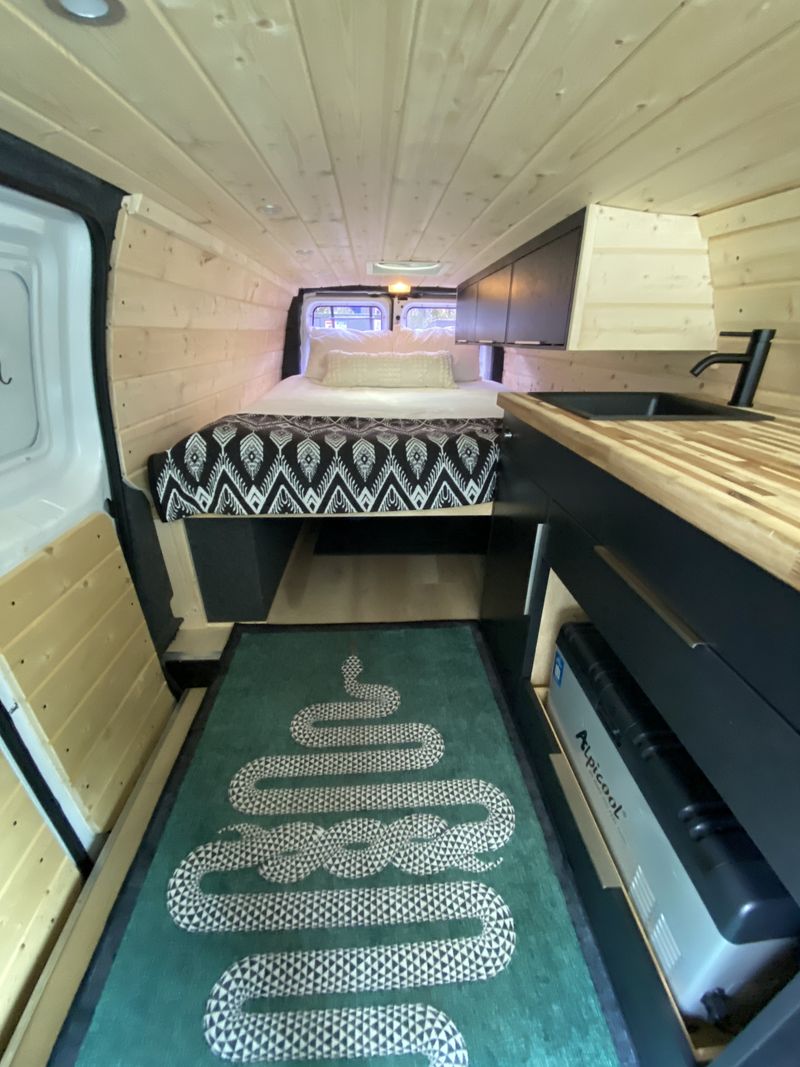 Picture 1/26 of a Professionally converted Ford E-250 extended camper van for sale in Denver, Colorado