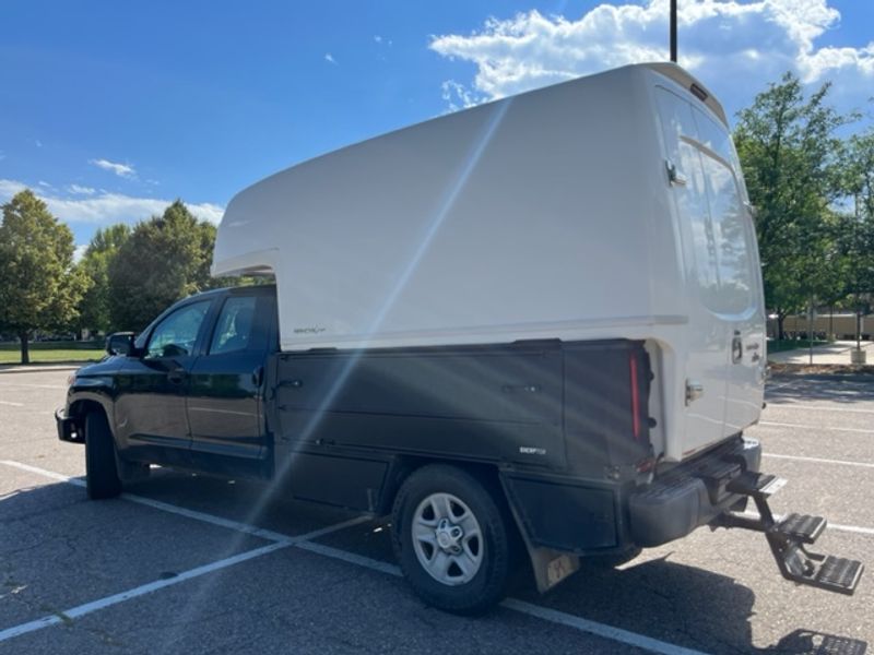 Picture 2/26 of a Toyota Tundra with Flatbed and Fiberglass Camper Shell for sale in Denver, Colorado