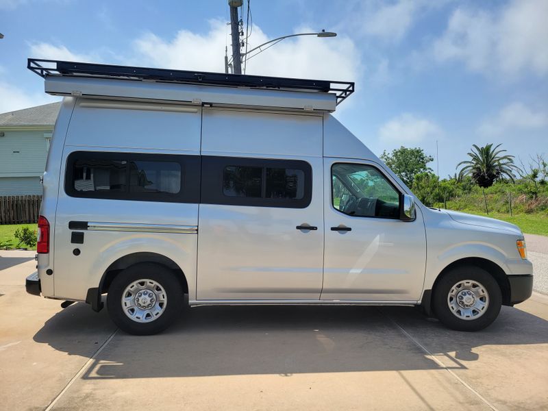 Picture 1/22 of a Nissan NV 3500 HD High Roof 4x4 Van Conversion for sale in Galveston, Texas