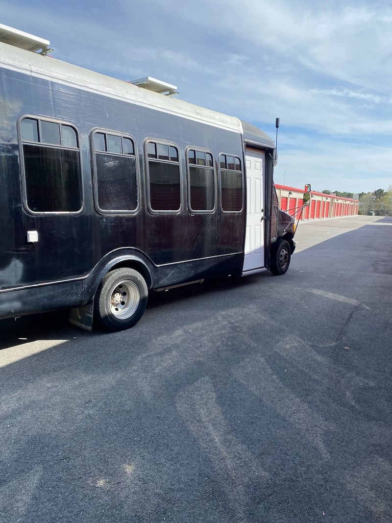 Picture 1/8 of a 2002 Ford e450 diesel converted shuttle bus - reduced price for sale in Durham, North Carolina