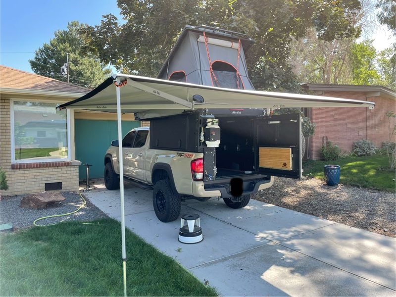 Picture 5/16 of a 2016 Toyota Tacoma TRD OR w/Alu-Cab Canopy Camper for sale in Denver, Colorado