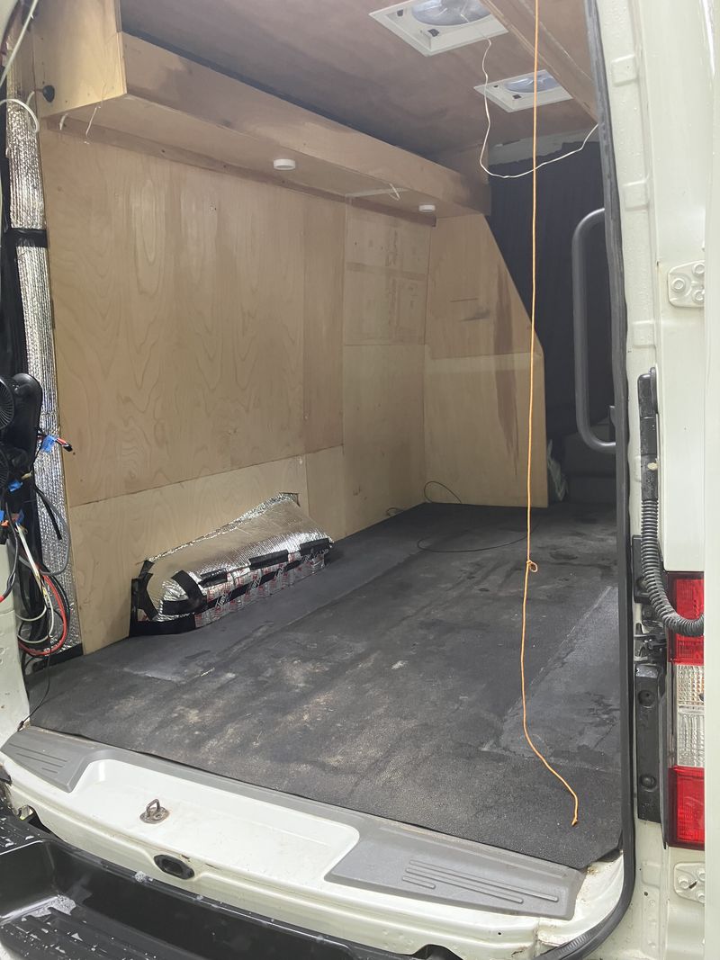 Picture 2/19 of a 2015 Nissan NV 2500 HD high top solar panels and fans for sale in Freeport, Maine