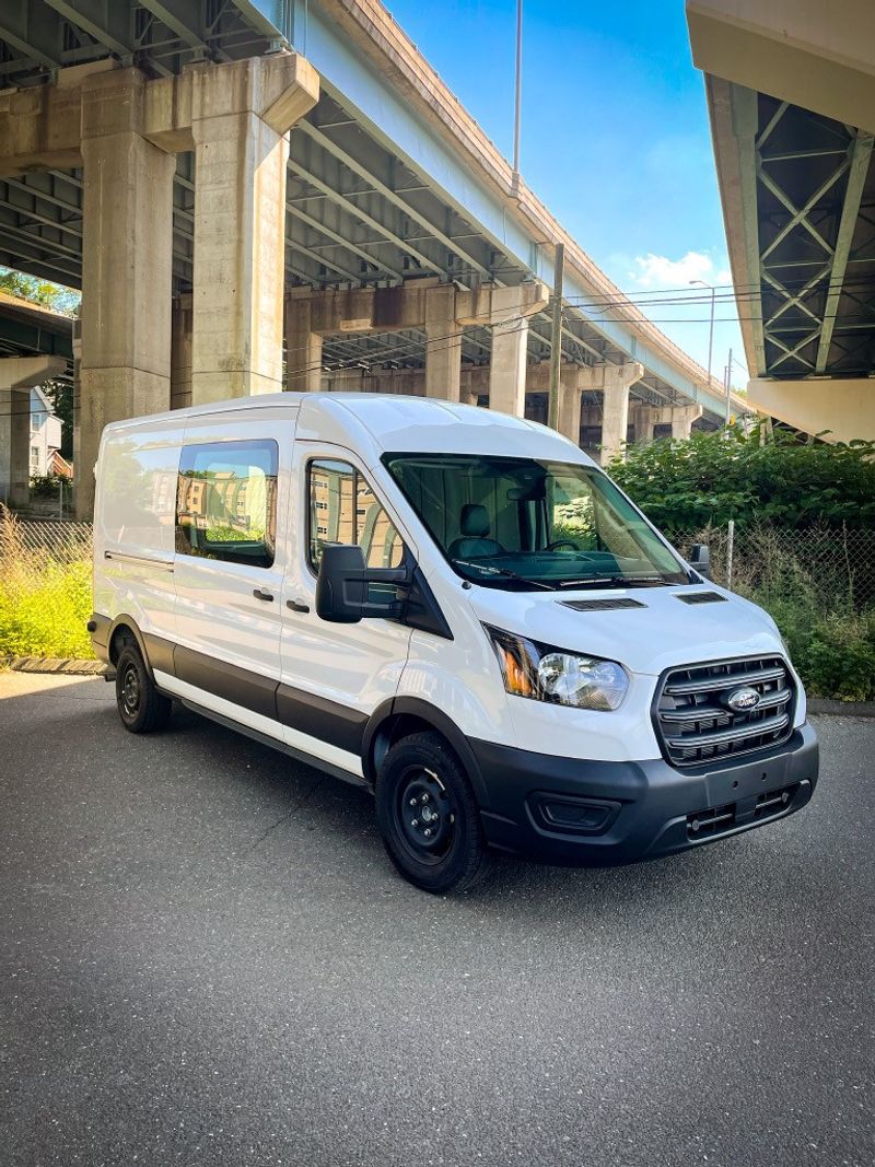 Picture 1/10 of a 2020 Ford Transit-250 MR 148WB (950 miles) for sale in Watertown, Connecticut