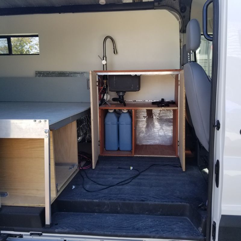 Picture 3/8 of a 2019 Medium Roof Ford Transit 130WB for sale in Big Bear Lake, California