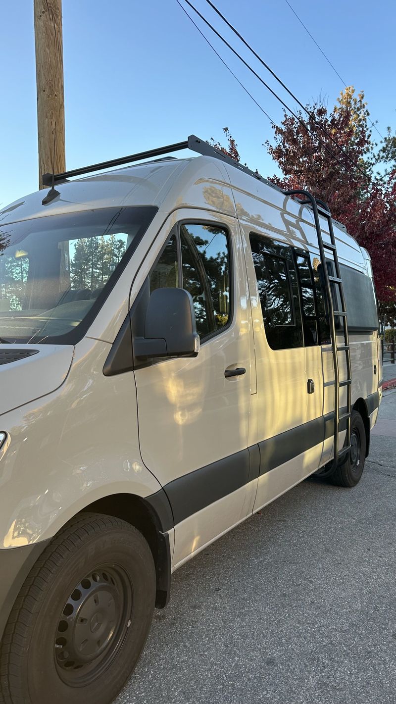 Picture 1/18 of a 144 Sprinter sits & sleeps 5 / ELEVATOR BED / bathroom / A/C for sale in Big Bear City, California