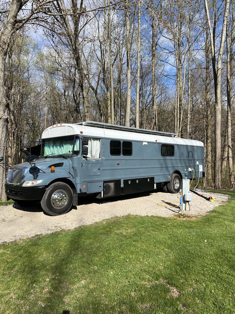 Picture 1/35 of a 2005 International CE300 Custom Skoolie for sale in Benton Harbor, Michigan