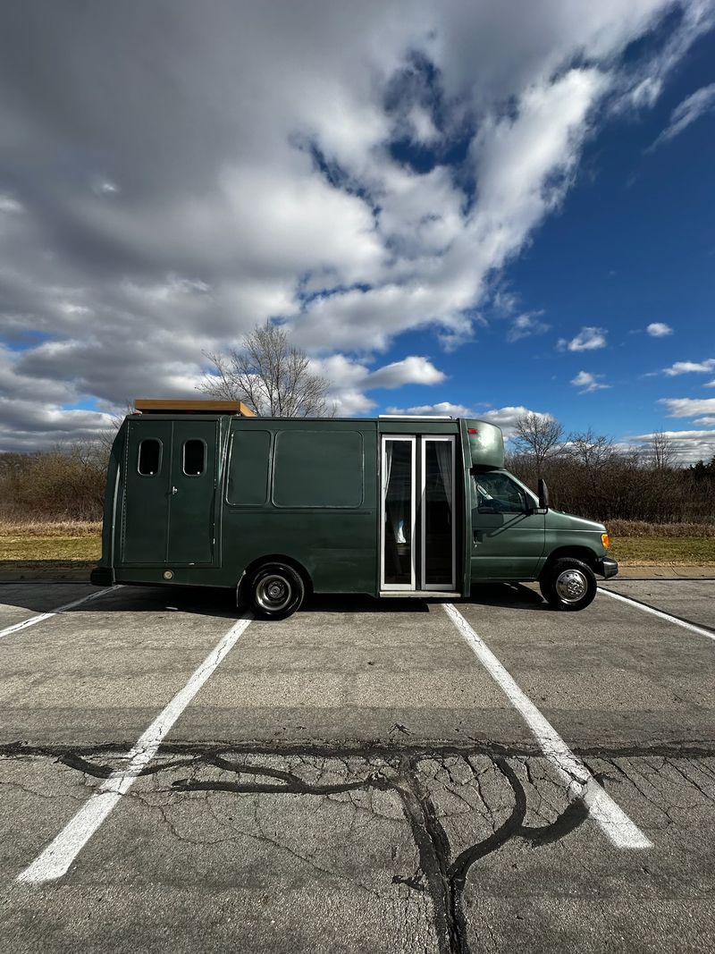 Picture 1/23 of a 2004 Ford E450 Shuttle Bus Conversion for sale for sale in Sedalia, Missouri