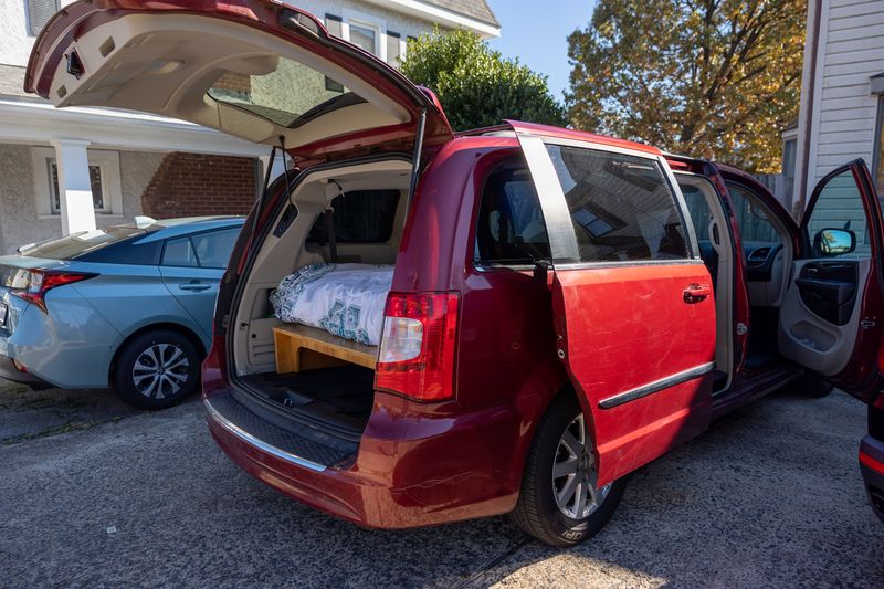 Picture 1/15 of a 2014 Chrysler Town & Country with camping insert and bed! for sale in Brooklyn, New York