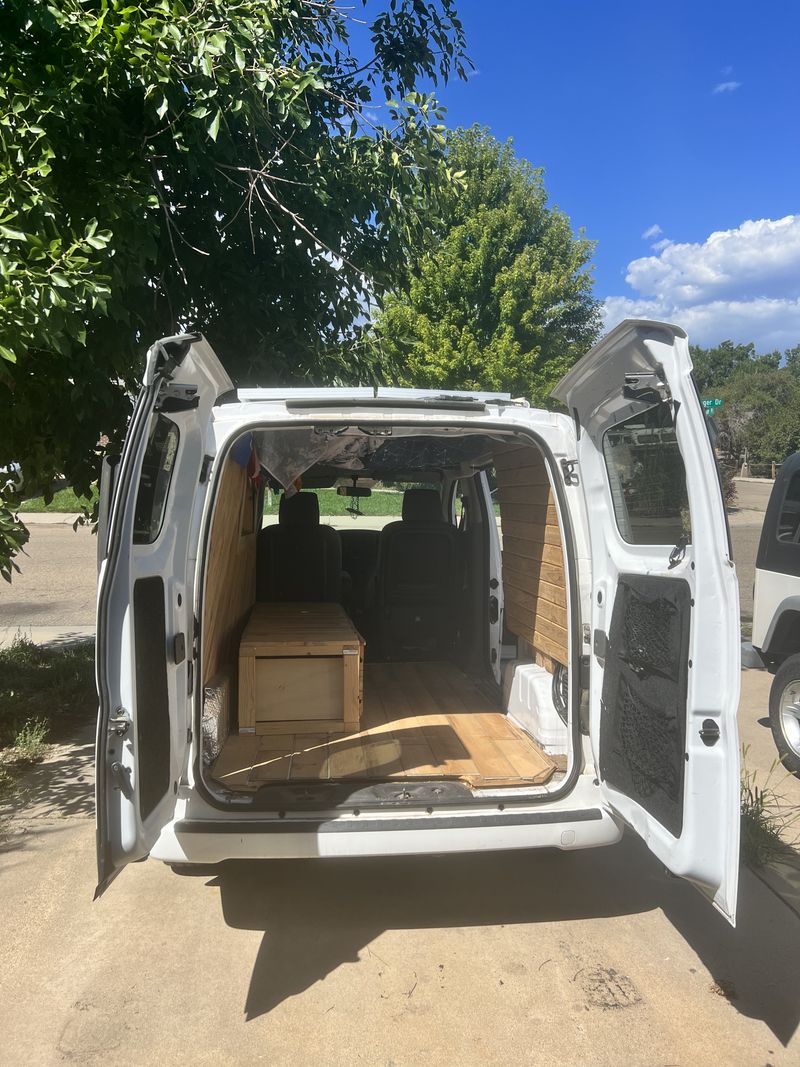 Picture 1/14 of a 2021 Nissan NV200 for sale in Longmont, Colorado
