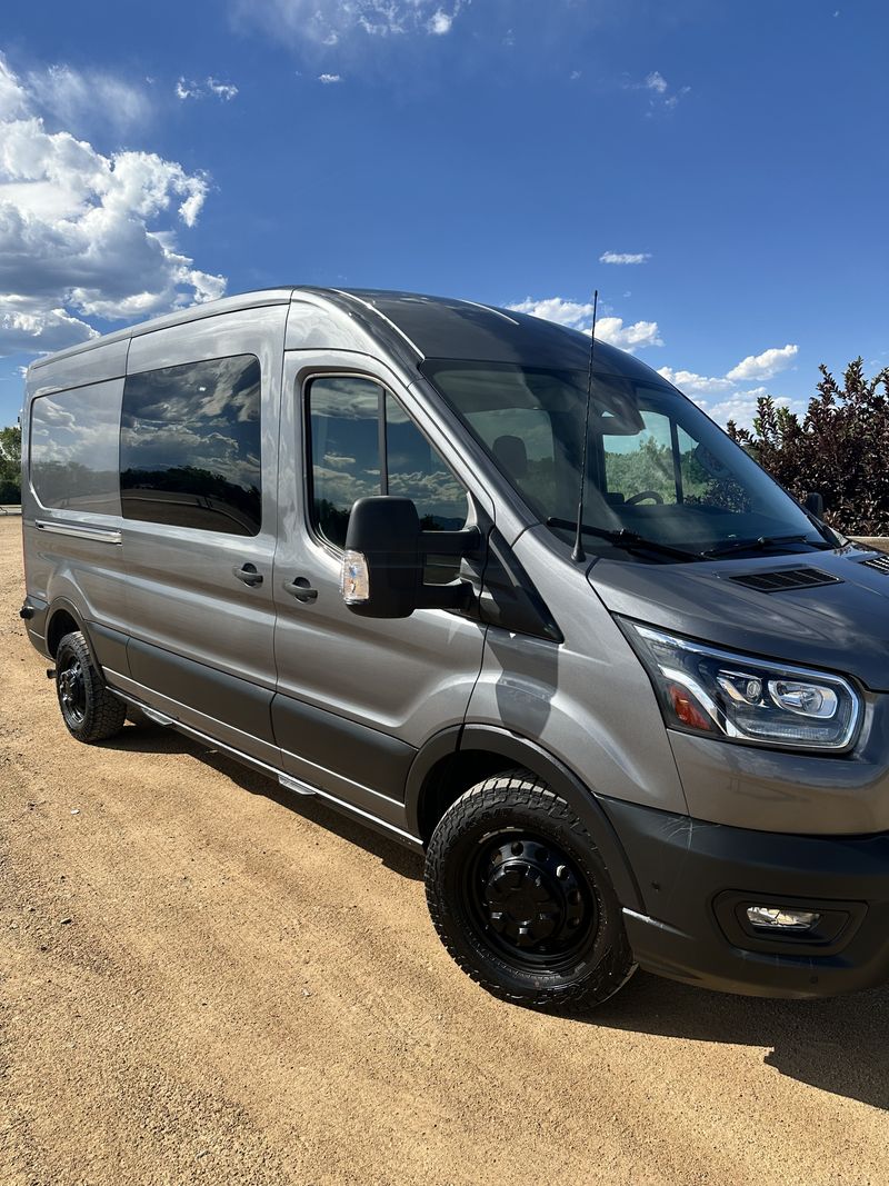 Picture 1/8 of a 2021 Ford transit crew awd ecoboost low miles for sale in Longmont, Colorado