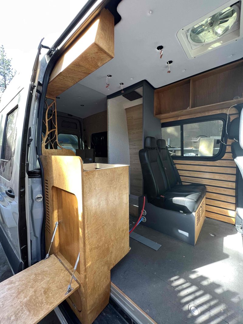 Picture 1/19 of a 4x4 144 NEW Sprinter camper van with bathroom & electric bed for sale in Big Bear City, California