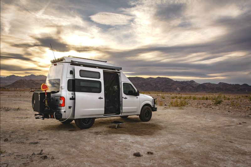Picture 1/27 of a 2013 Nissan NV3500HD Camper Van | Advanced 4x4 | Pop-Top for sale in Henderson, Nevada