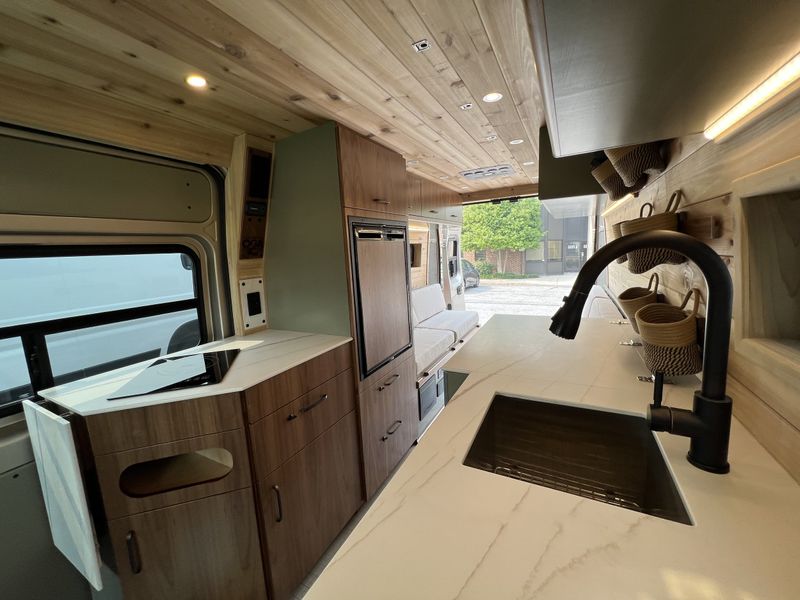 Picture 3/14 of a Bench-to-Bed Layout in New 2022 RAM Promaster 159” WB EXT HR for sale in Frederick, Maryland