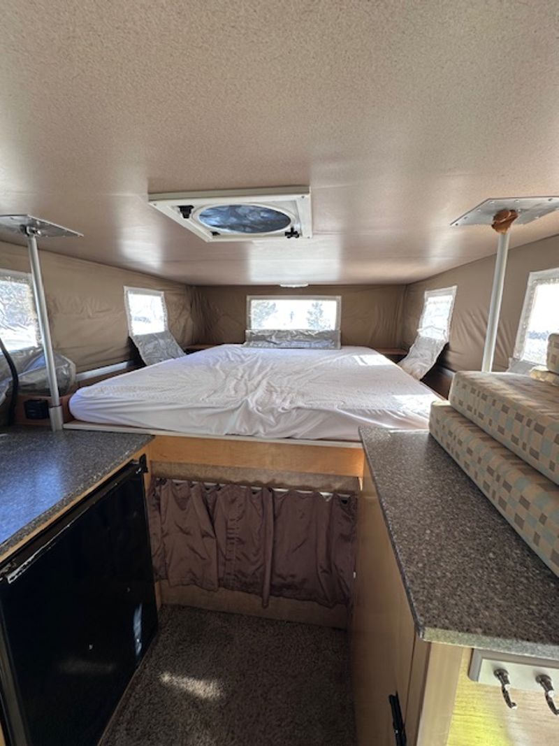 Picture 3/8 of a 2011 GMC Duramax with Phoenix Pop Up for sale in Grand Lake, Colorado