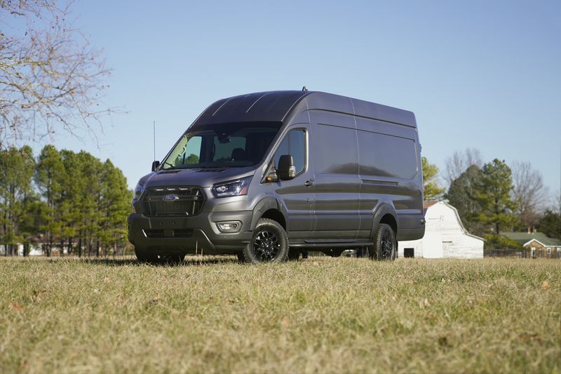 Picture 1/13 of a 2023 Carbonized Gray Trail Ford Transit 350 High-Roof EXT for sale in Fayetteville, Arkansas