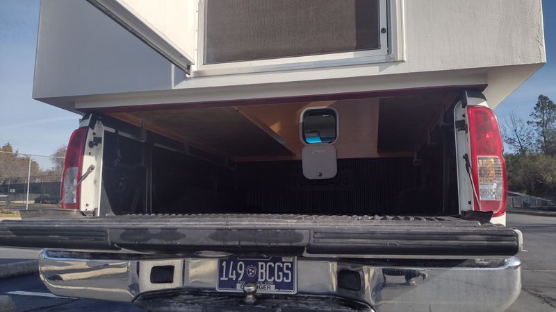 Picture 2/15 of a 2005 Nissan Frontier with 660lb ultralight camper, great MPG for sale in Sarasota, Florida