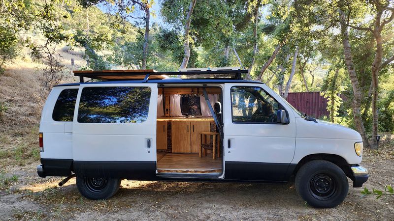 Picture 2/7 of a Ford E-150 Van Conversion w/ roof deck and solar LOW MILES for sale in Los Angeles, California