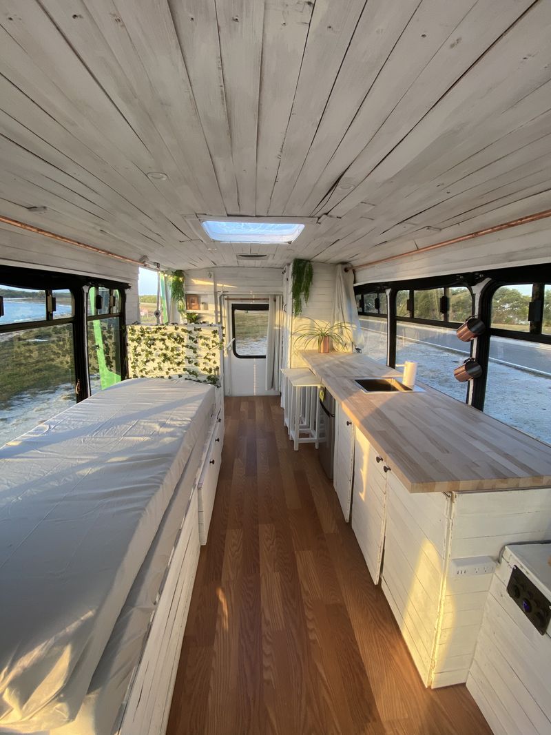 Picture 5/21 of a Boho Dream Skoolie Shuttle Bus with SKYLIGHT + SWING for sale in Saint Petersburg, Florida