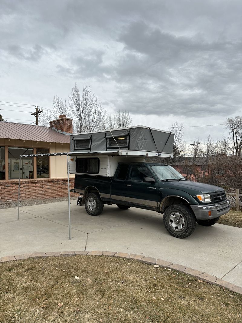 Picture 1/16 of a 2000 Tacoma & 2009 ATC Bobcat for sale in Durango, Colorado