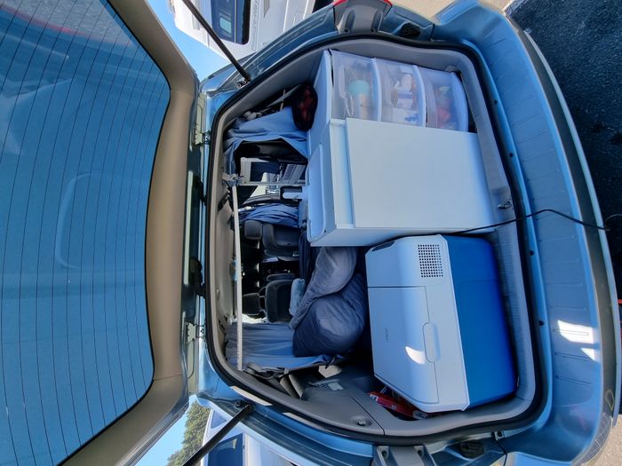 Photo showing the fridge and sink of a 2006 Toyota Sienna Campervan
