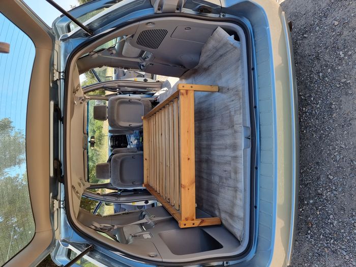 Photo showing the bed frame inside a 2006 Toyota Sienna Campervan